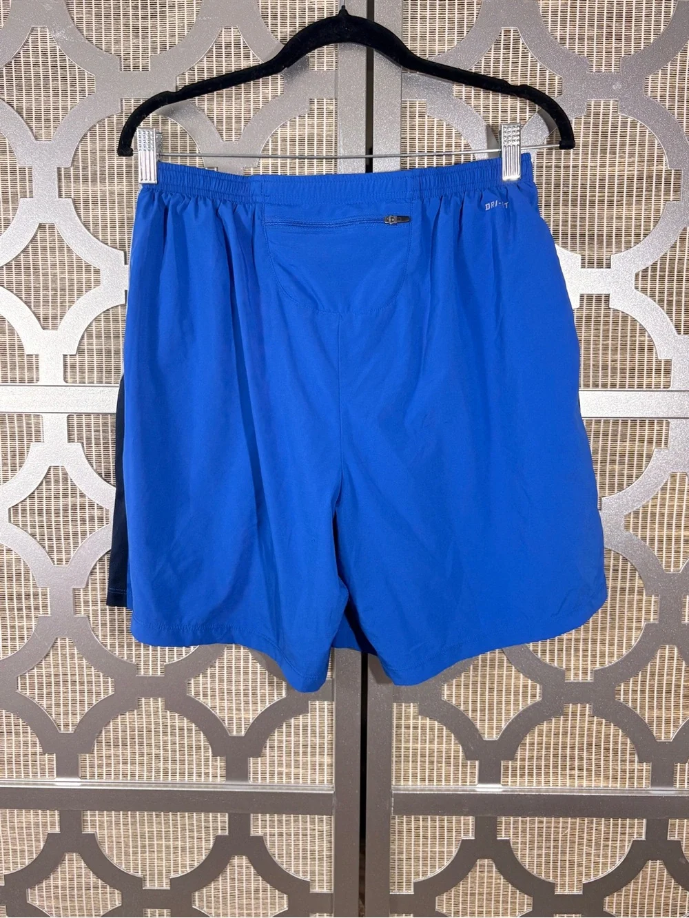 Nike Men’s Royal Blue Athletic Shorts with Gray & Navy Panels and has a snag